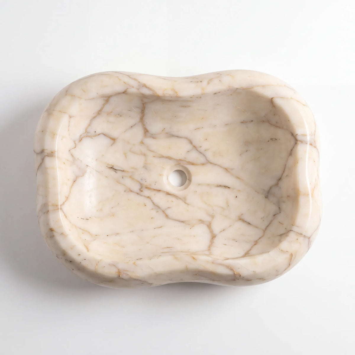 Detailed view of RMD-026 Aurevista Calacatta Gold marble vessel sink showing elegant golden veining