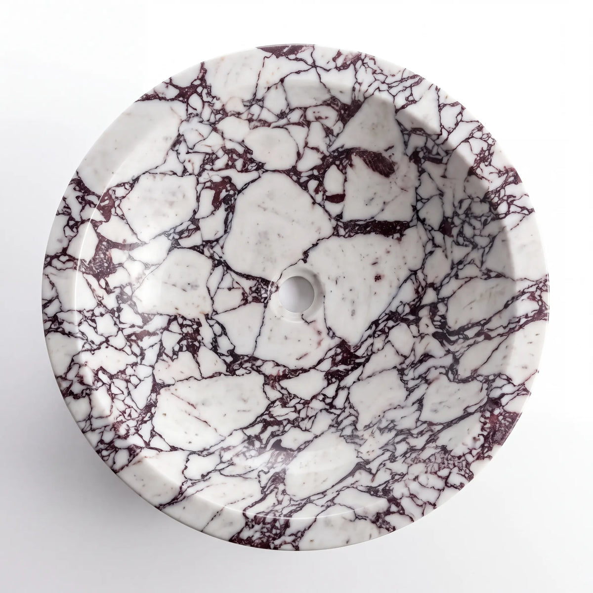 Detailed view of RMD-078 Viadora Calacatta Viola marble vessel sink showing dramatic natural veining