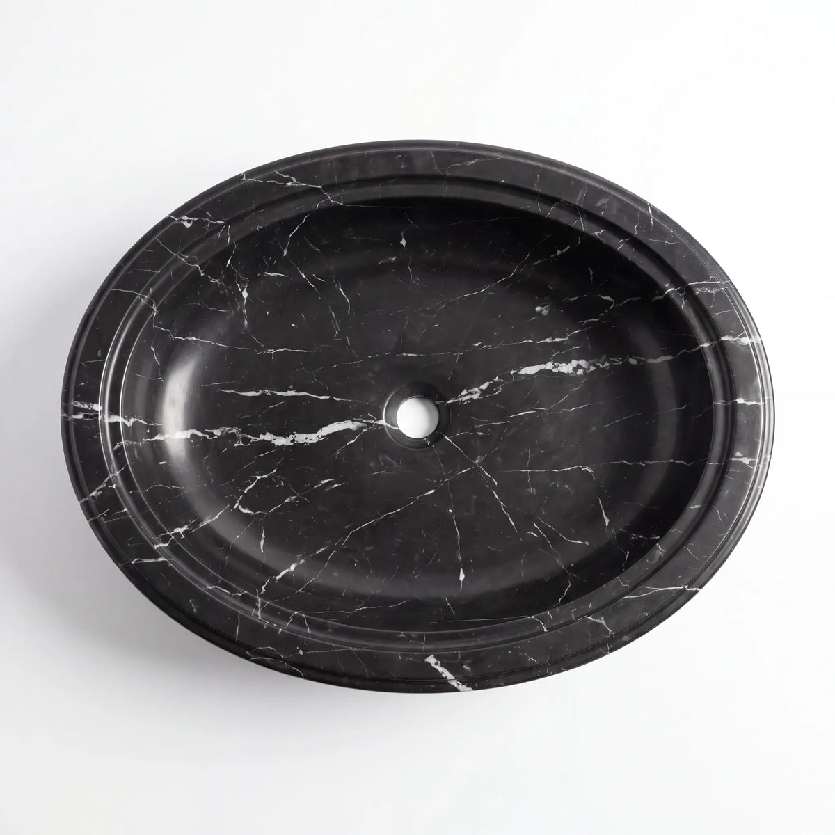 Detailed view of RMD-099 Neravora Nero Marquina marble vessel sink showing distinctive white veining