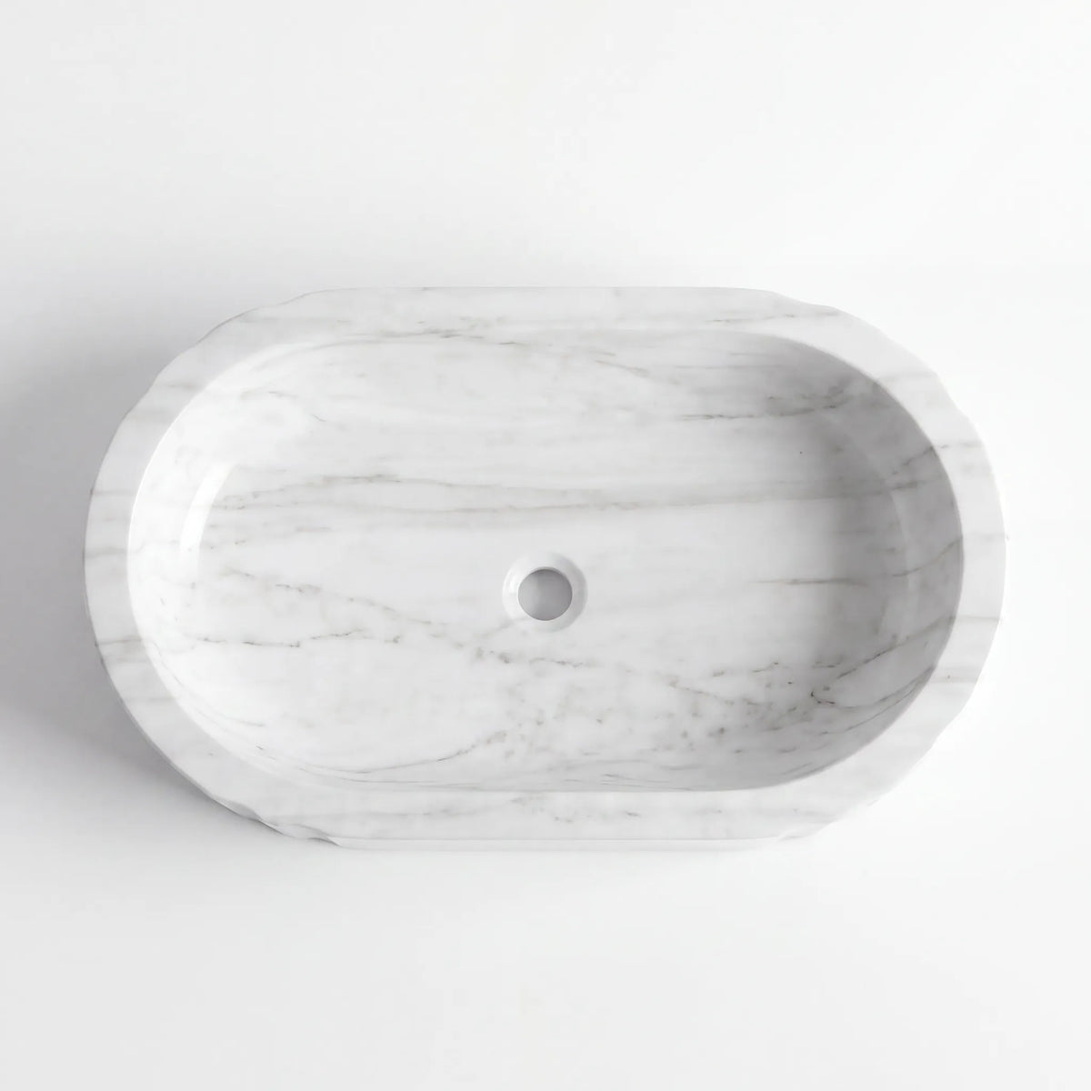 Detailed view of RMD-144 Carravora Carrara white marble vessel sink showing elegant natural veining