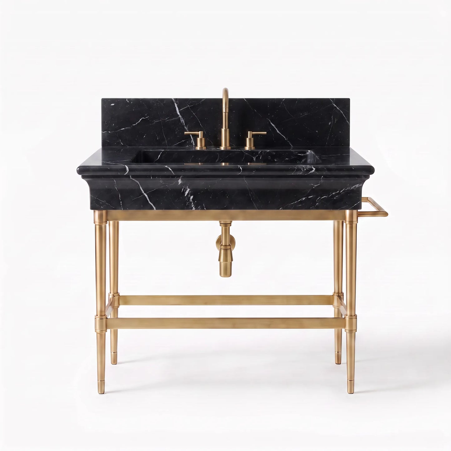 A freestanding bathroom vanity with a black marble sink basin and backplate, paired with a polished gold brass pedestal base and faucet.