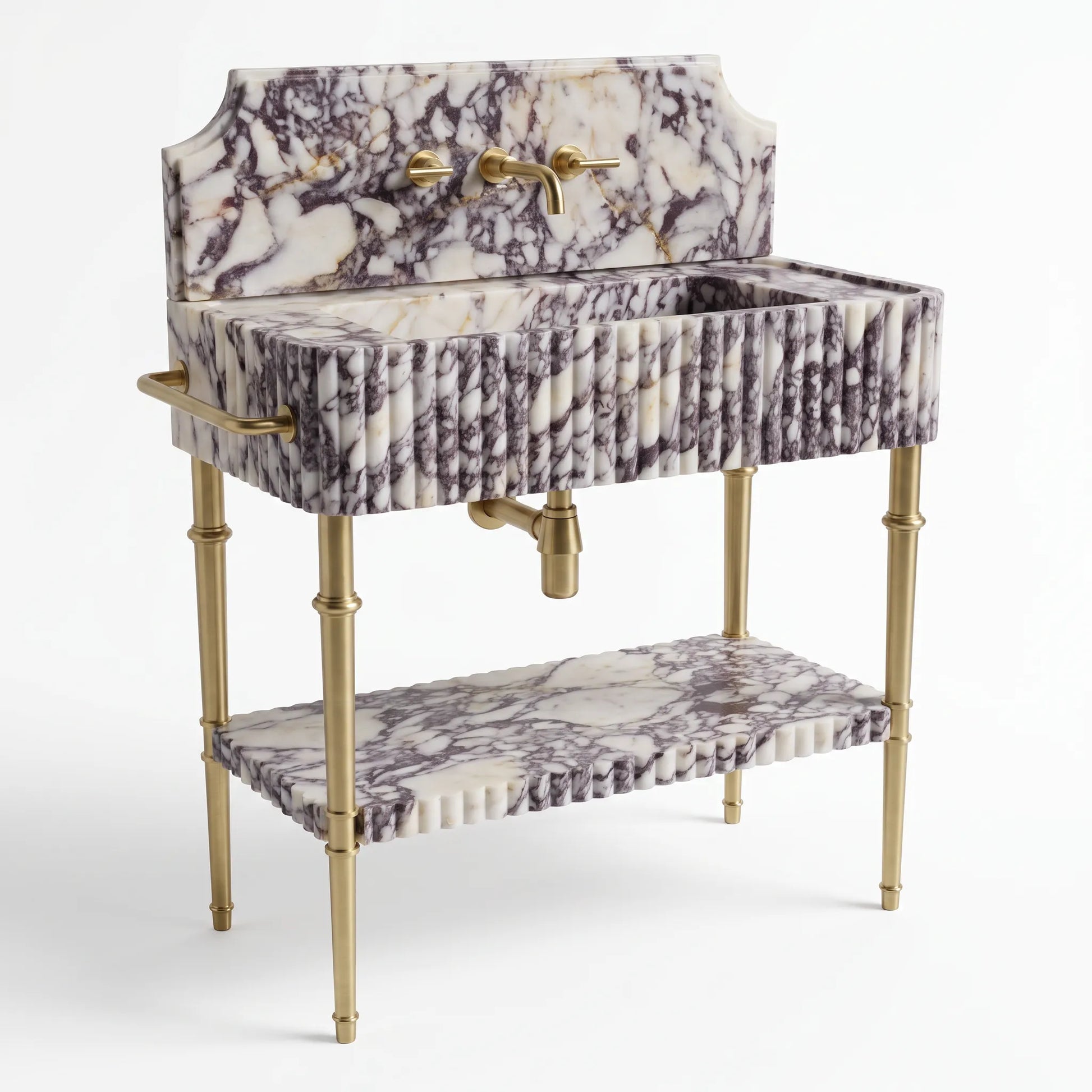 A vintage-style vanity sink with a white and gray marble patterned fabric upholstery and polished gold brass hardware, legs, and faucet, shown on a clean white background.