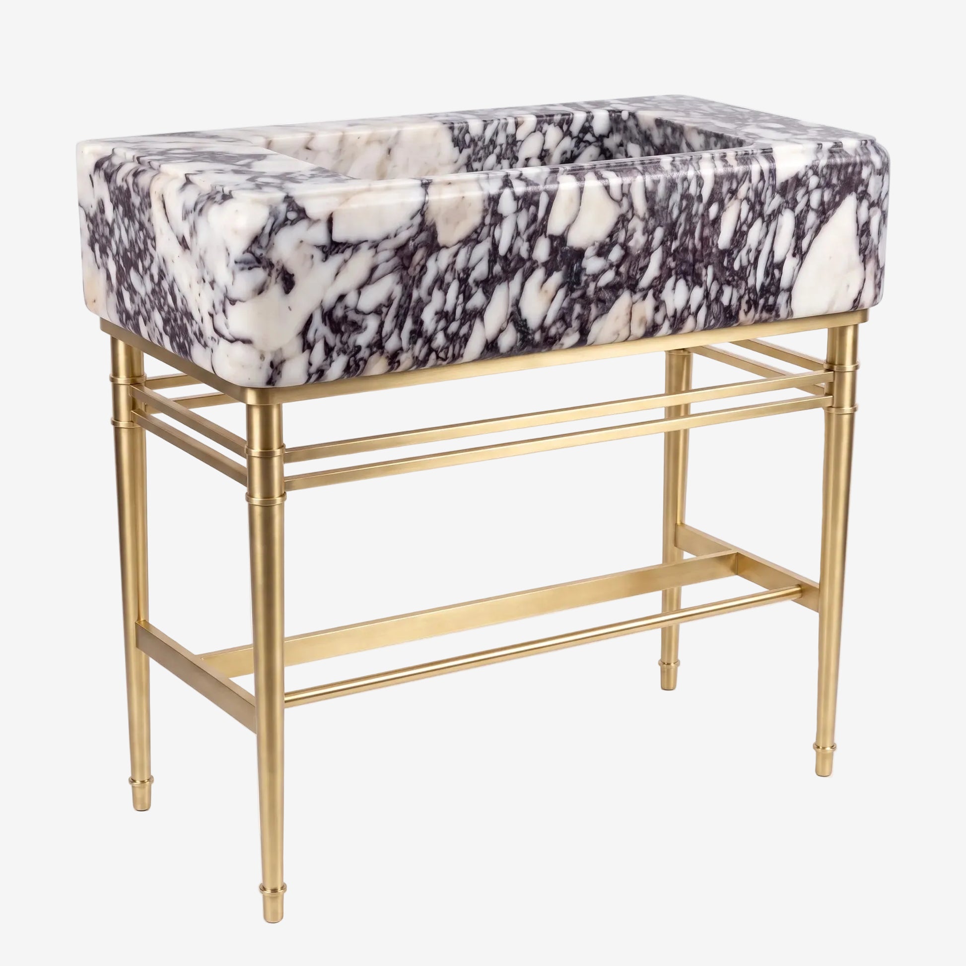 A rectangular vanity sink with a black and white marble-patterned cushioned top and a gold-finished metal frame, shown on a white background.