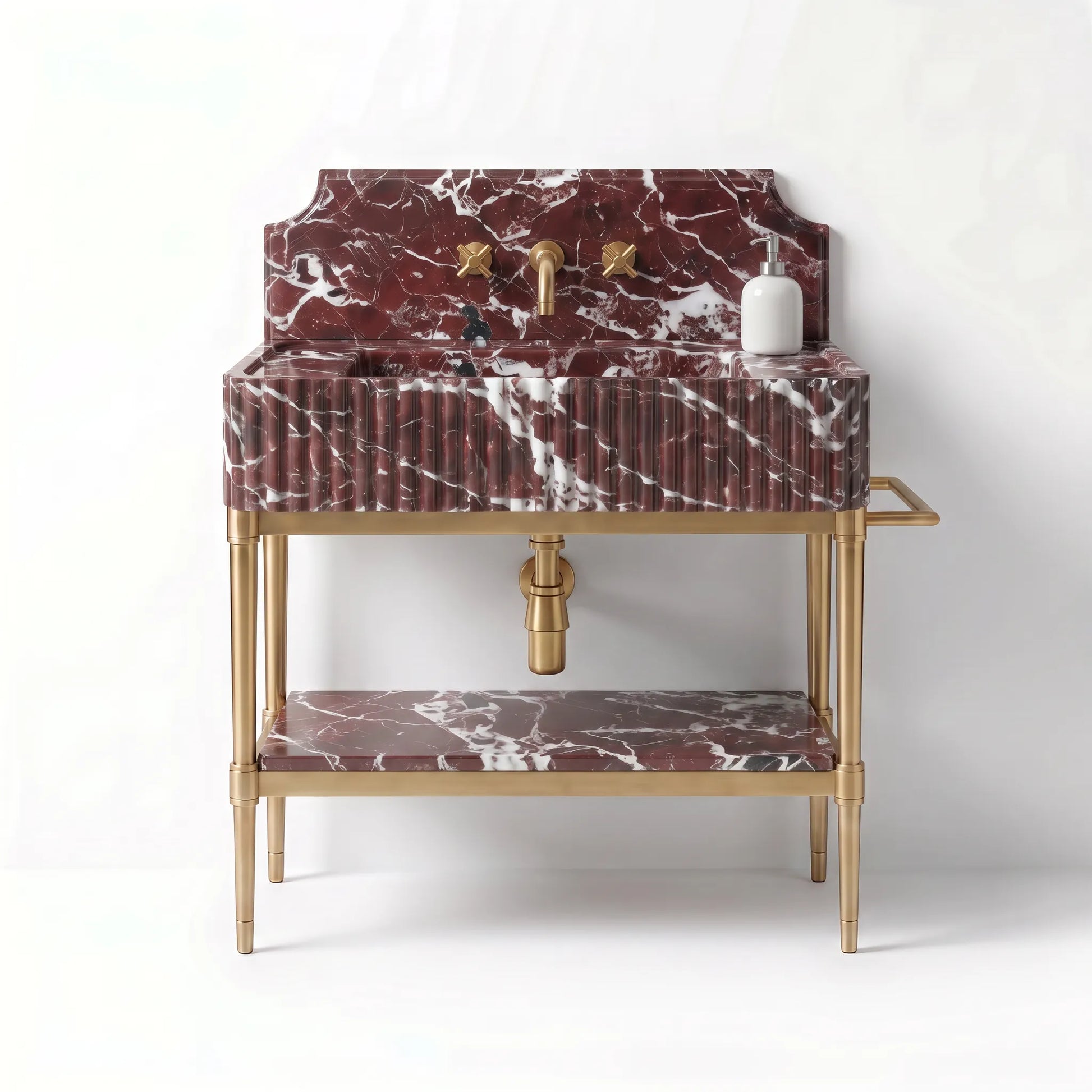 A freestanding bathroom vanity with a rectangular sink and backsplash in deep red marble with white veining, supported by a gold-tone metal frame with an open lower shelf.