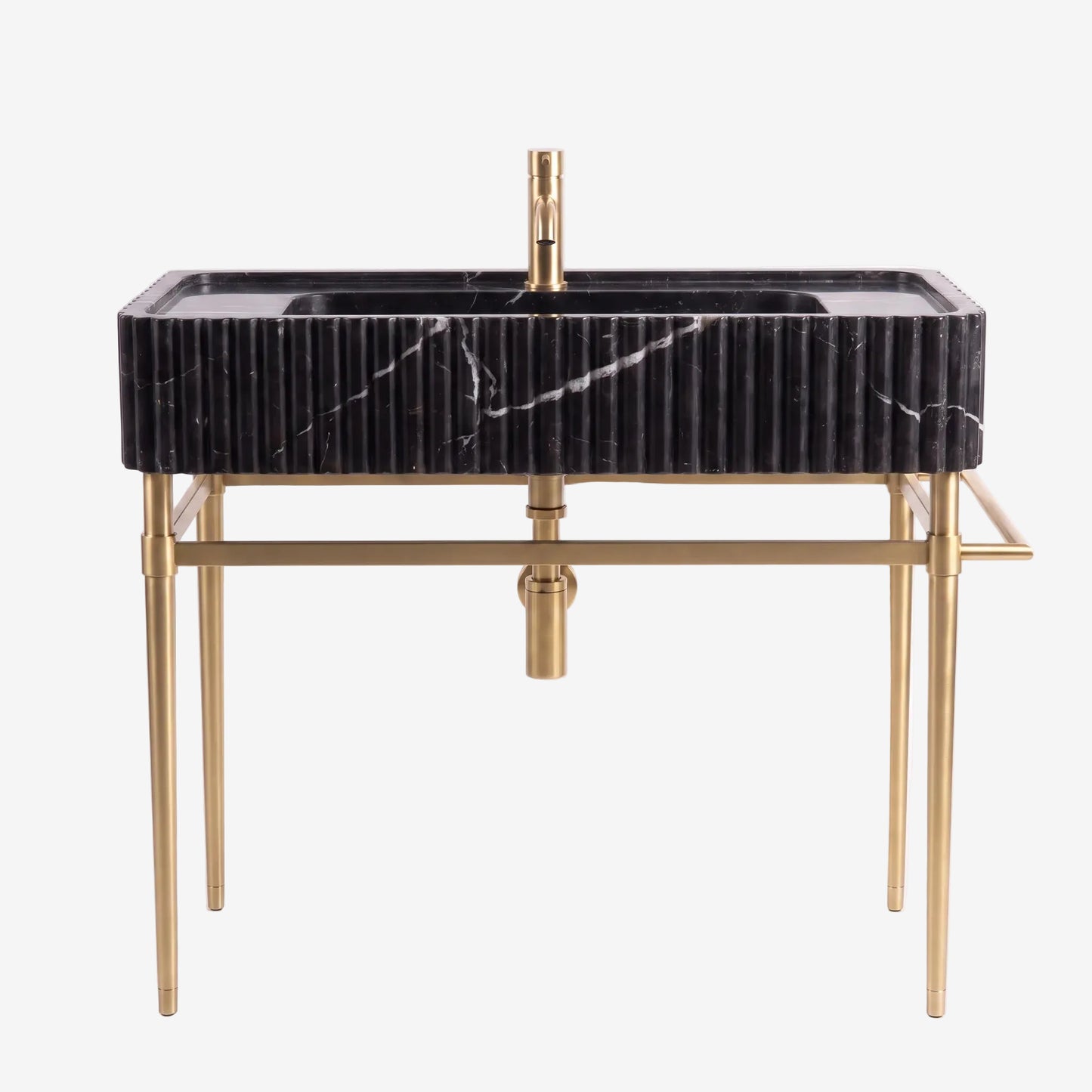A modern rectangular bathroom vanity with a black marble sink top featuring white veining, supported by a gold-finished metal frame with slim legs and a matching gold faucet.