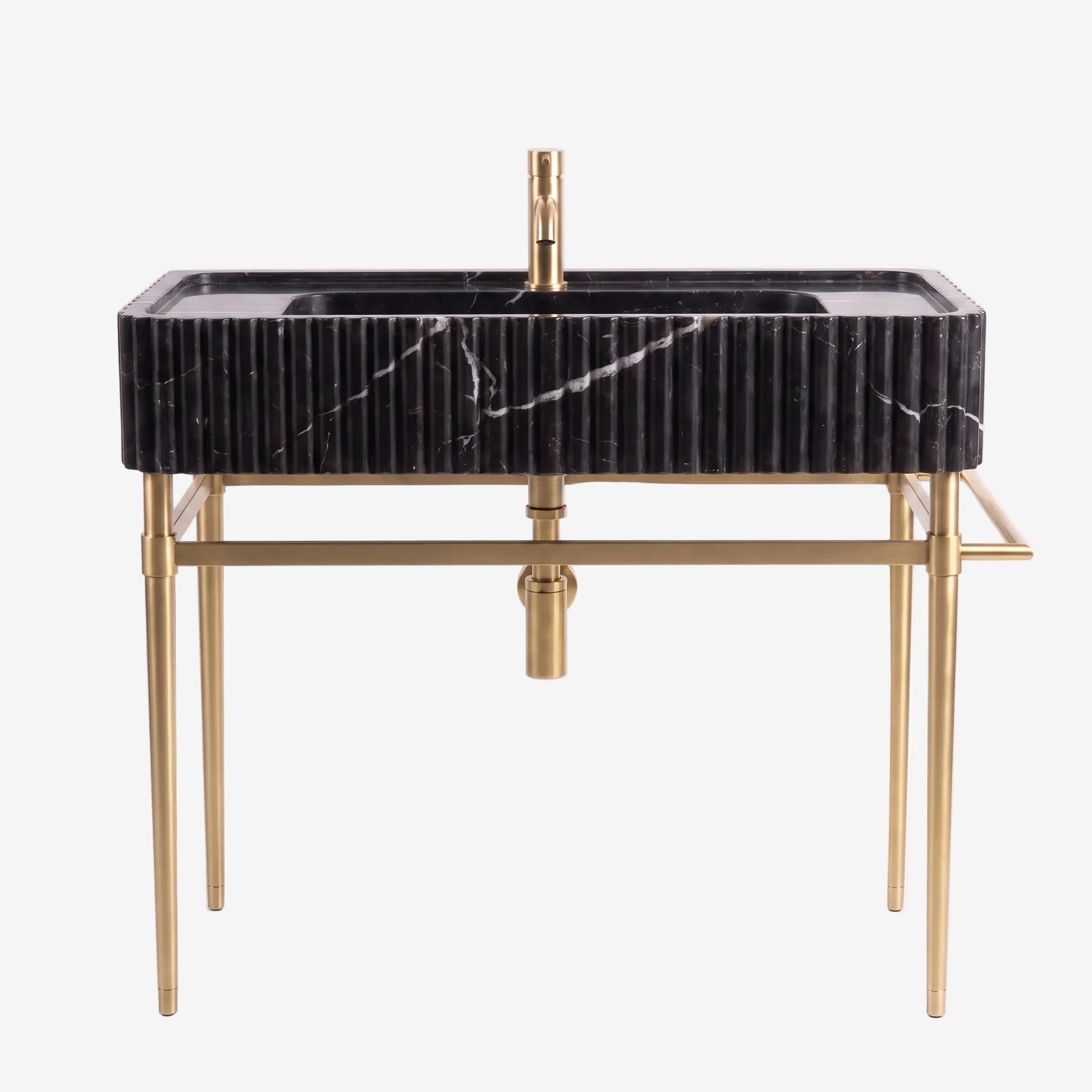 A modern rectangular bathroom vanity with a black marble sink top featuring white veining, supported by a gold-finished metal frame with slim legs and a matching gold faucet.