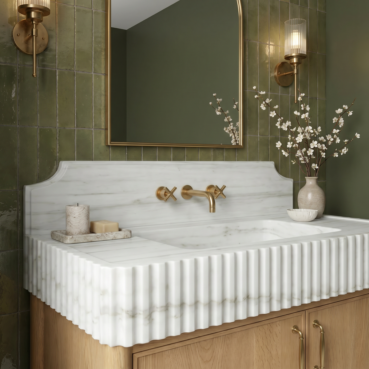Hand-carved fluted Carrara White marble sink with natural stone veining and oak vanity cabinet