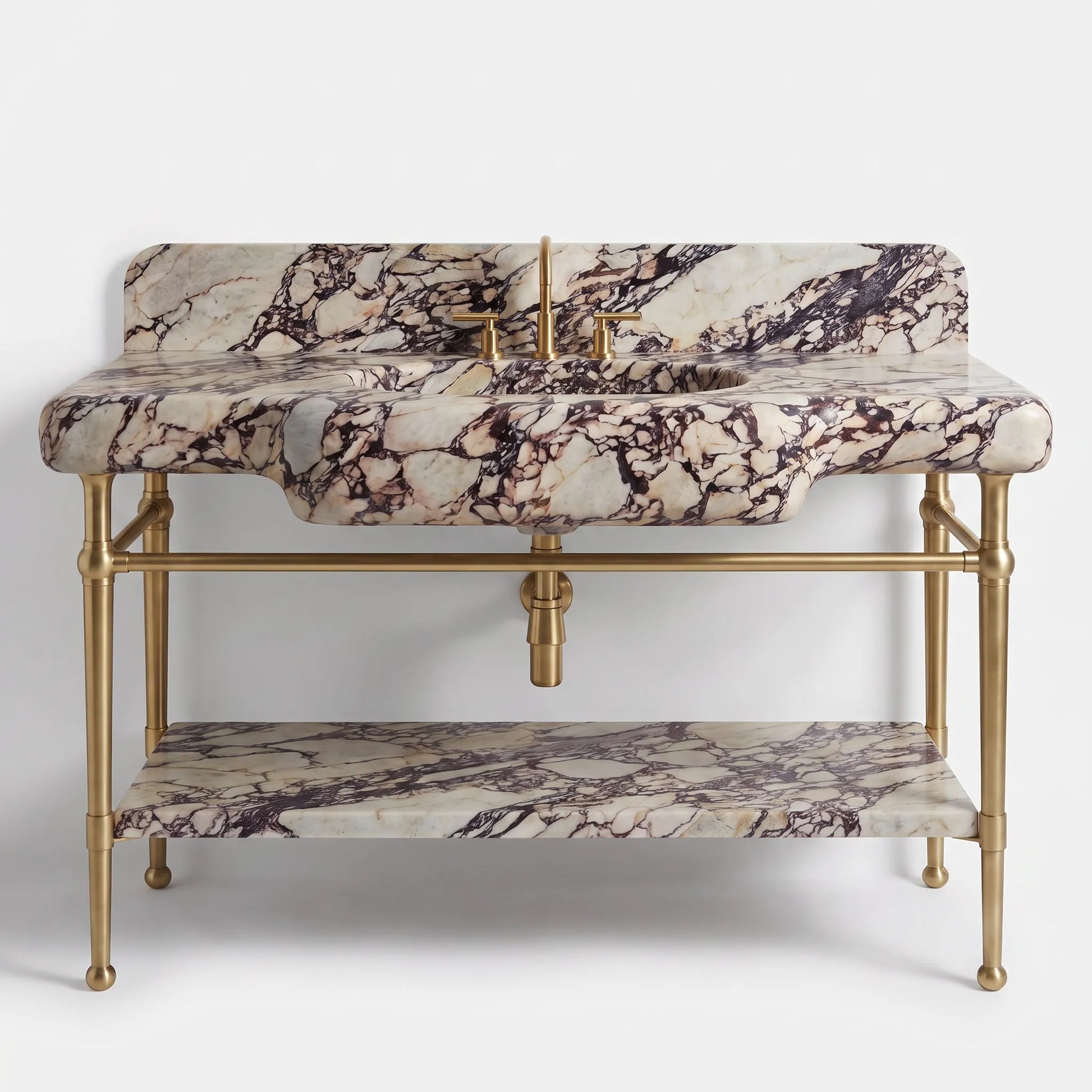 A vintage-style bathroom vanity featuring a marble countertop and matching lower shelf with dramatic black and brown veining, supported by a polished brass frame with a matching brass faucet and drain.