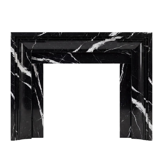 Custom Nero Marquina black marble fireplace mantel with white veining and Art Deco-inspired geometric architectural details.
