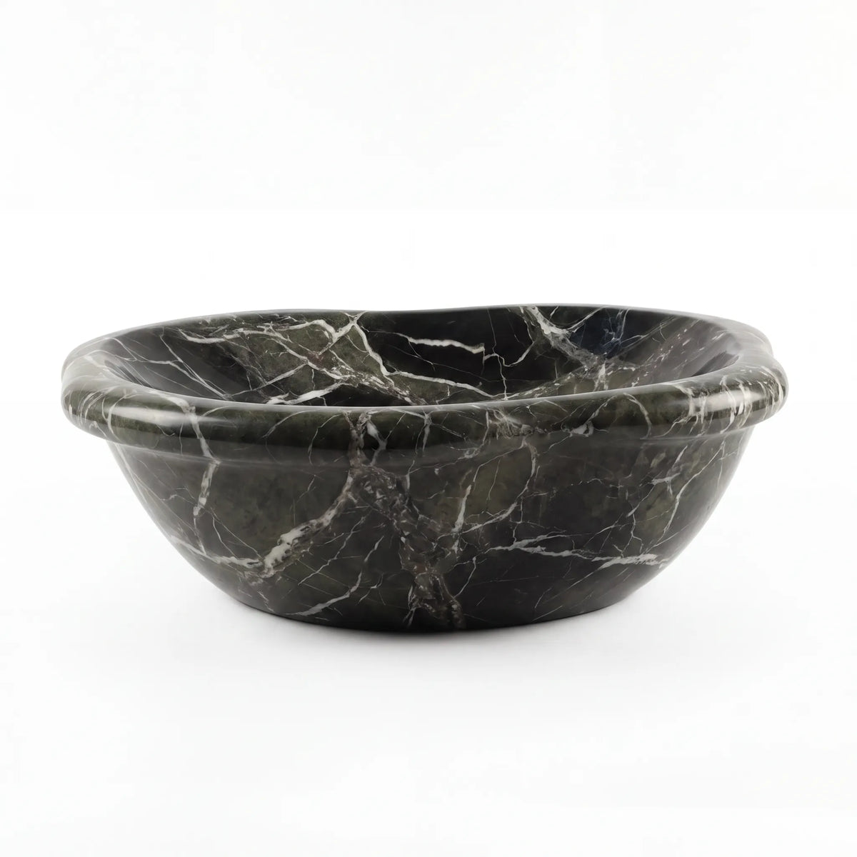 Detailed view of oval green marble vessel sink with natural stone veining