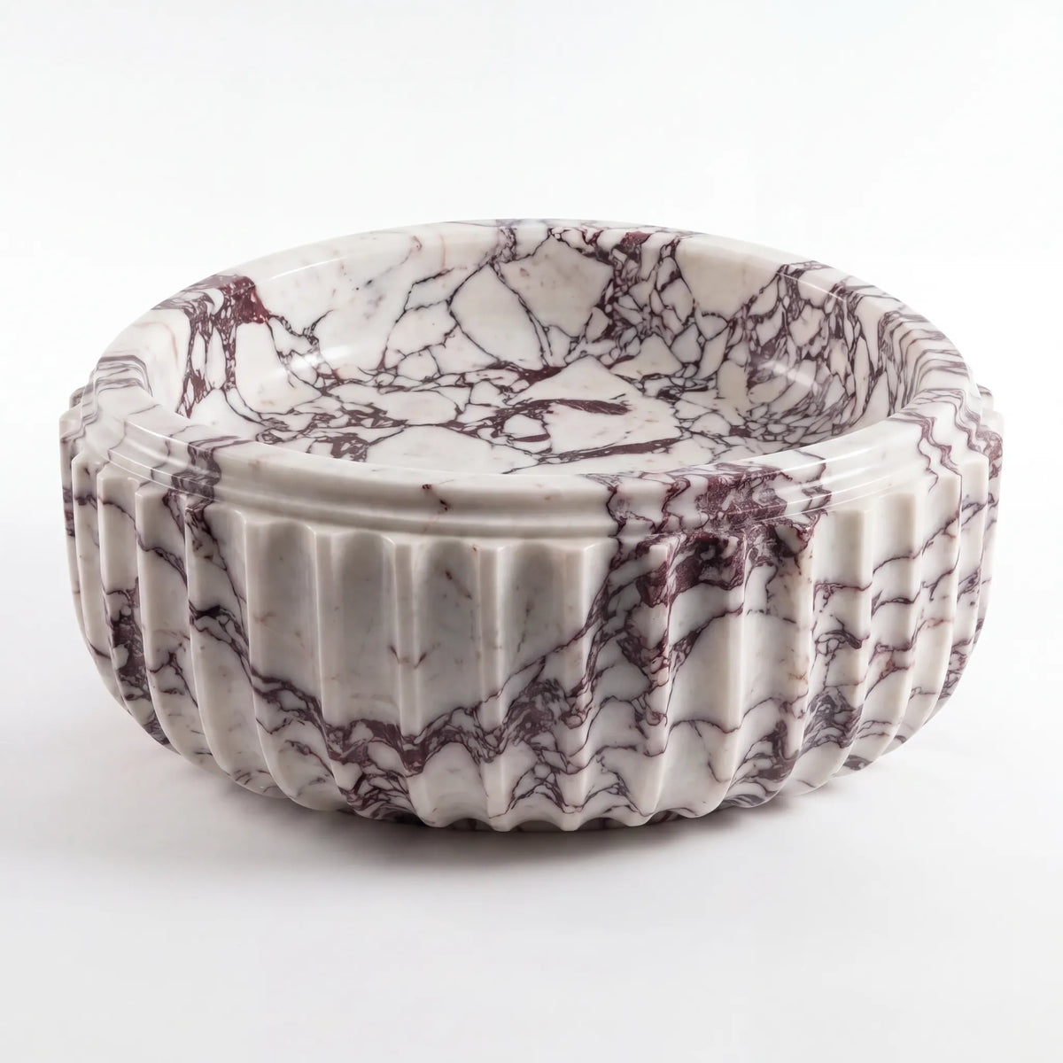 Front view of RMD-022 Violavora round Calacatta Viola marble vessel sink with polished finish