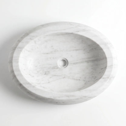 Detailed view of RMD-024 Carravissa Carrara white marble vessel sink showing soft natural veining