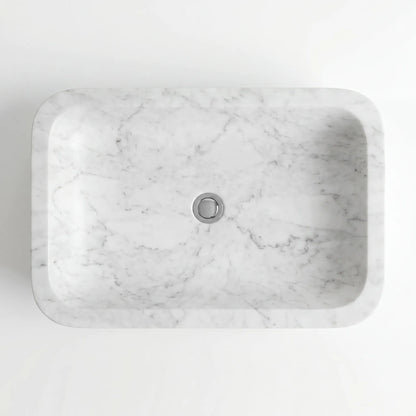 Detailed view of RMD-025 Carravelle Carrara white marble vessel sink showing soft natural veining