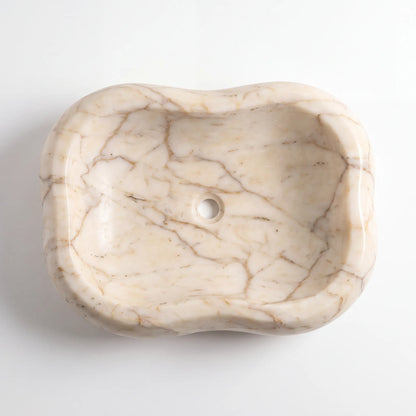 Detailed view of RMD-026 Aurevista Calacatta Gold marble vessel sink showing elegant golden veining
