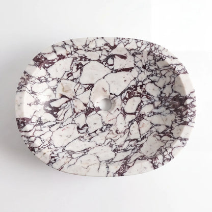 Detailed view of RMD-028 Violavena Calacatta Viola marble vessel sink showing dramatic natural veining