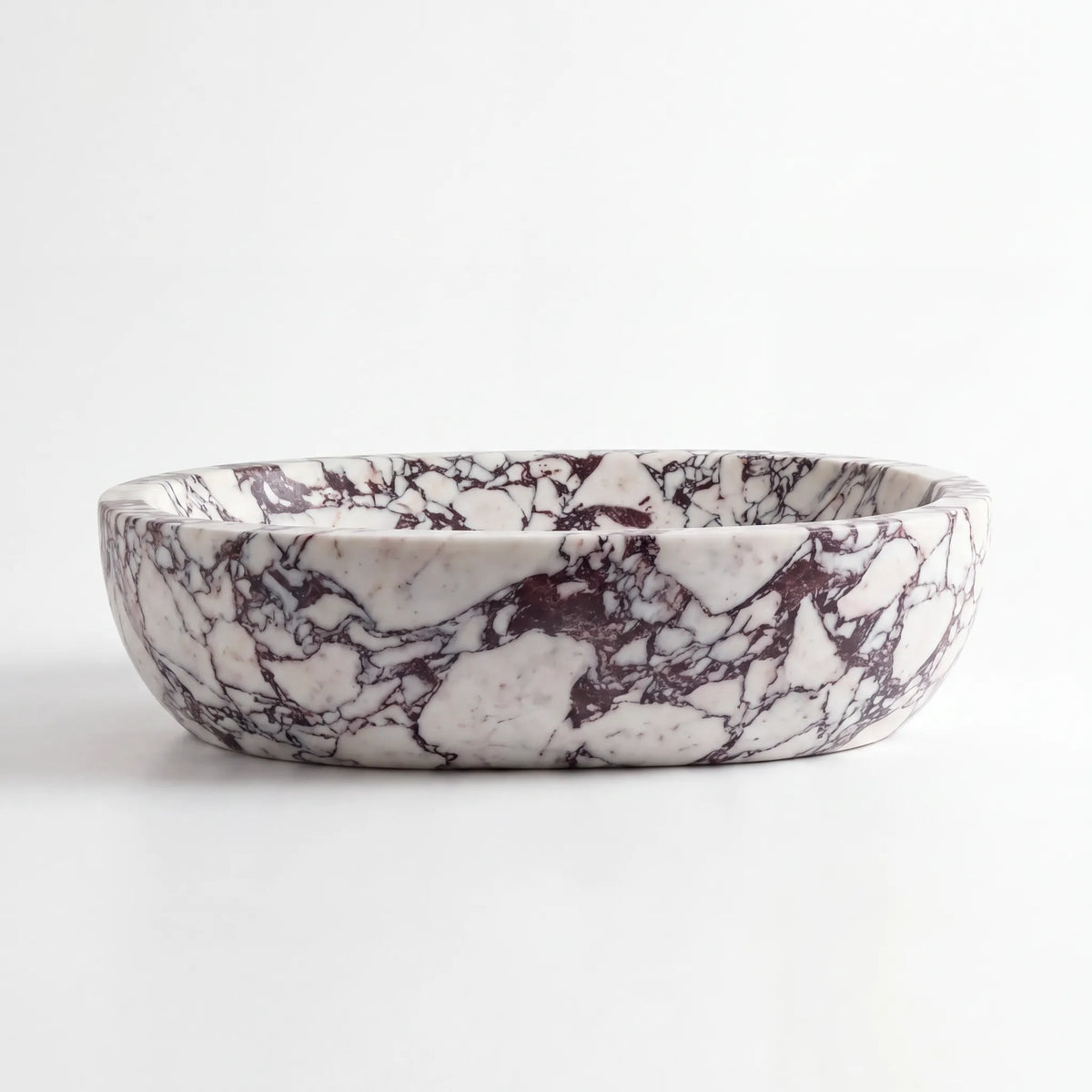 Front view of RMD-028 Violavena round Calacatta Viola marble vessel sink with polished finish