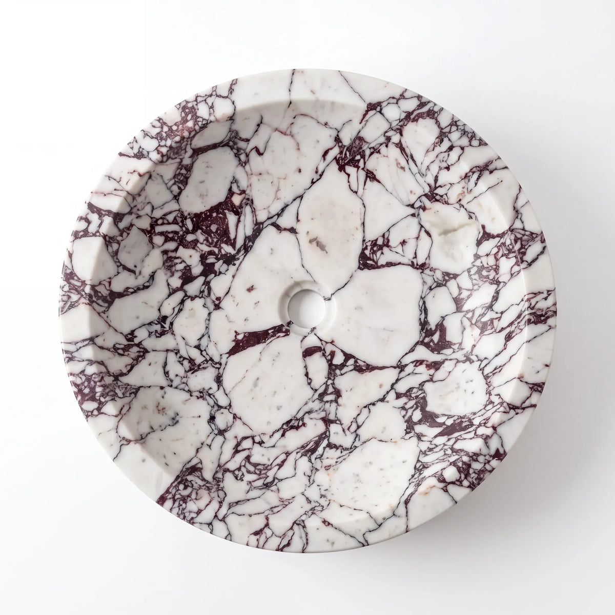 Detailed view of RMD-032 Viorelle Calacatta Viola marble vessel sink showing dramatic natural veining