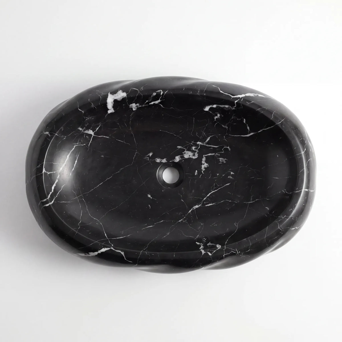 Detailed view of RMD-033 Nerovara Nero Marquina marble vessel sink showing distinctive white veining