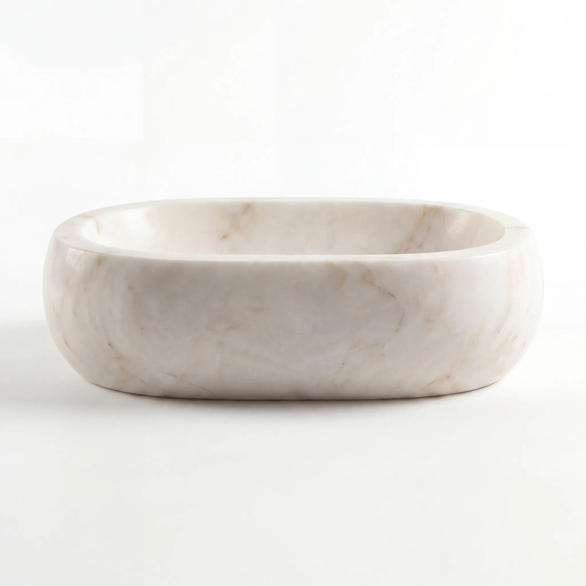 Front view of RMD-048 Cremavere rectangular cream and beige marble vessel sink with refined finish