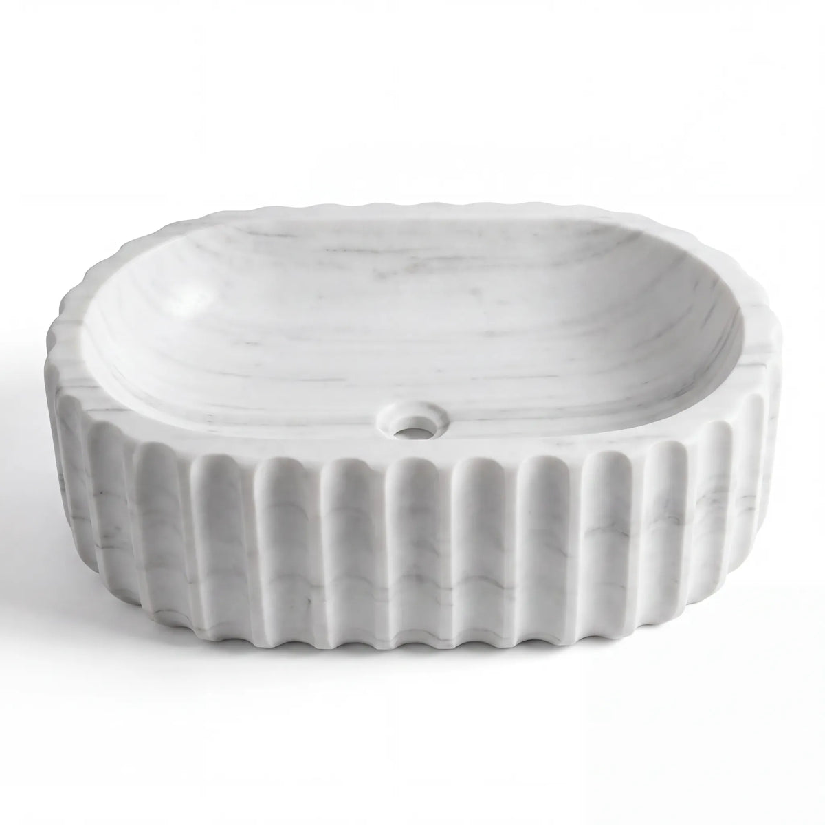 Detailed view of RMD-053 Carravante Carrara white marble vessel sink showing soft natural veining