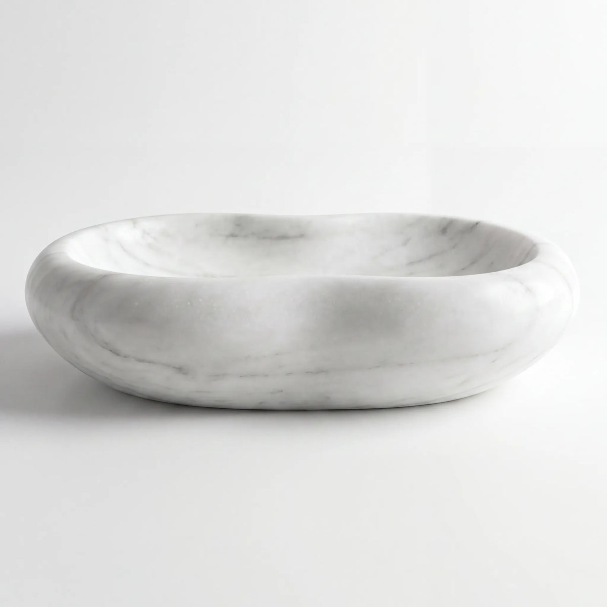 Front view of RMD-056 Carravena round Carrara white marble vessel sink with polished finish