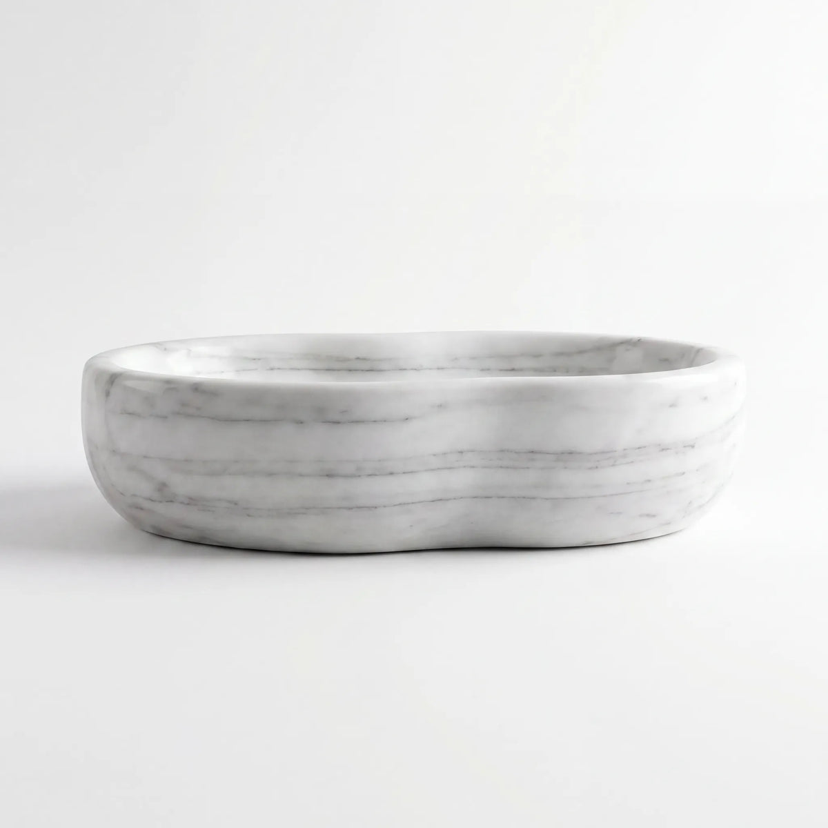 Front view of RMD-059 Carralisse round Carrara white marble vessel sink with polished finish