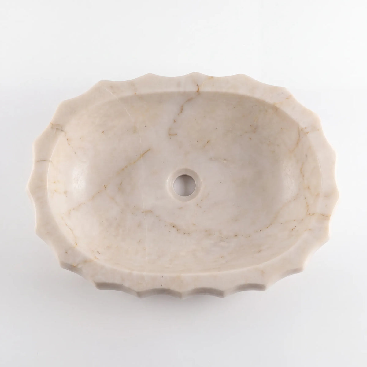 Detailed view of RMD-066 Aurevane Calacatta Gold marble vessel sink showing elegant golden veining