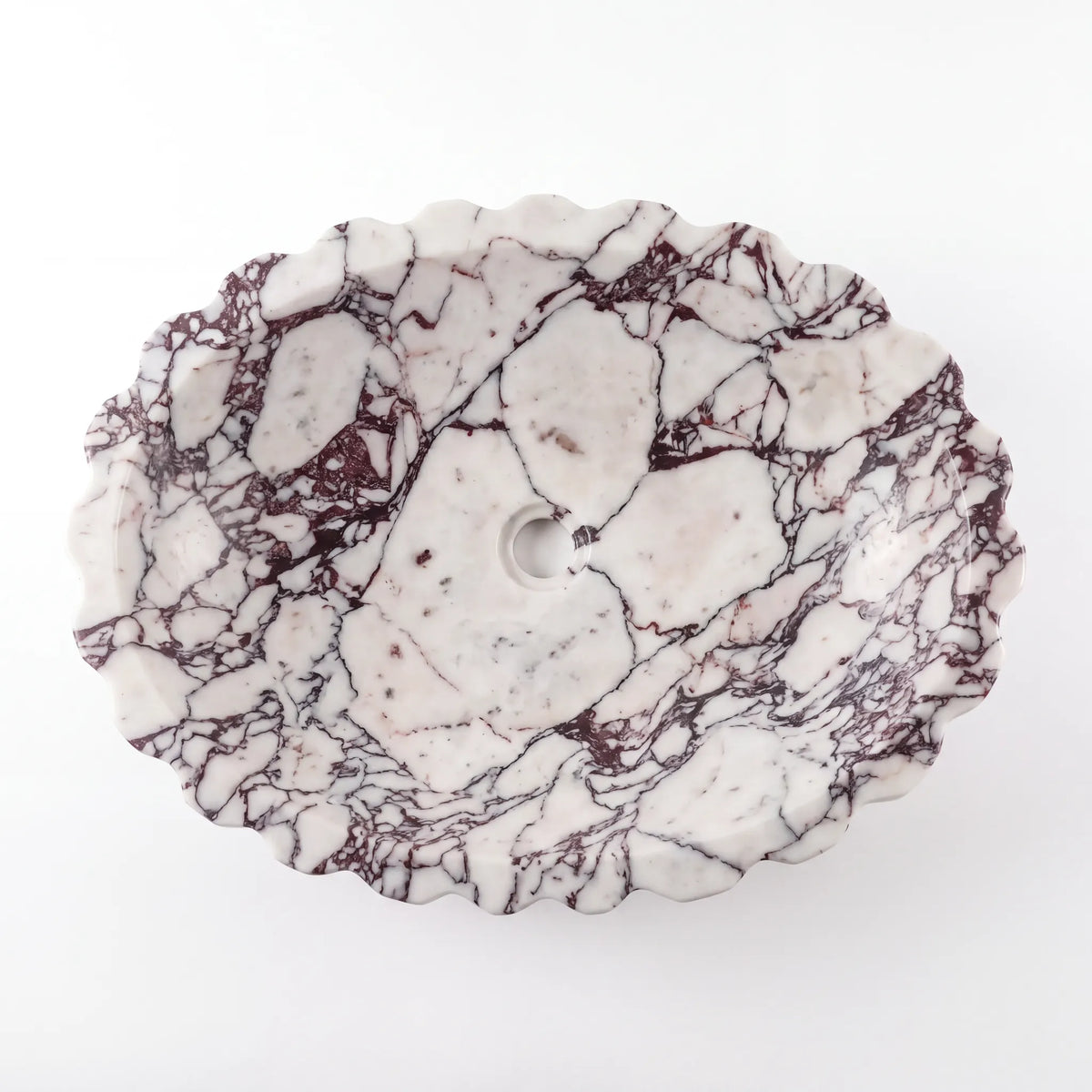Detailed view of RMD-070 Violessa Calacatta Viola marble vessel sink showing dramatic natural veining
