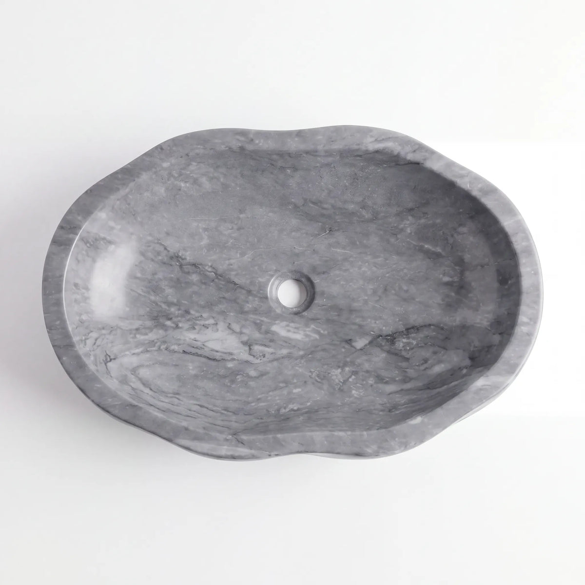 Detailed view of RMD-081 Grivora grey marble vessel sink showing distinctive natural veining