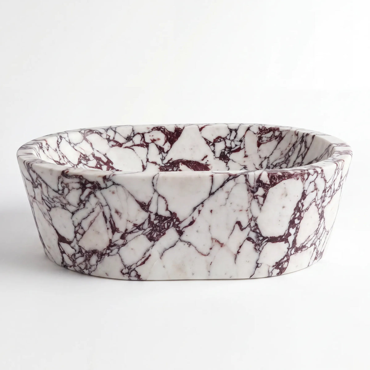 Front view of RMD-100 Violara round Calacatta Viola marble vessel sink with polished finish