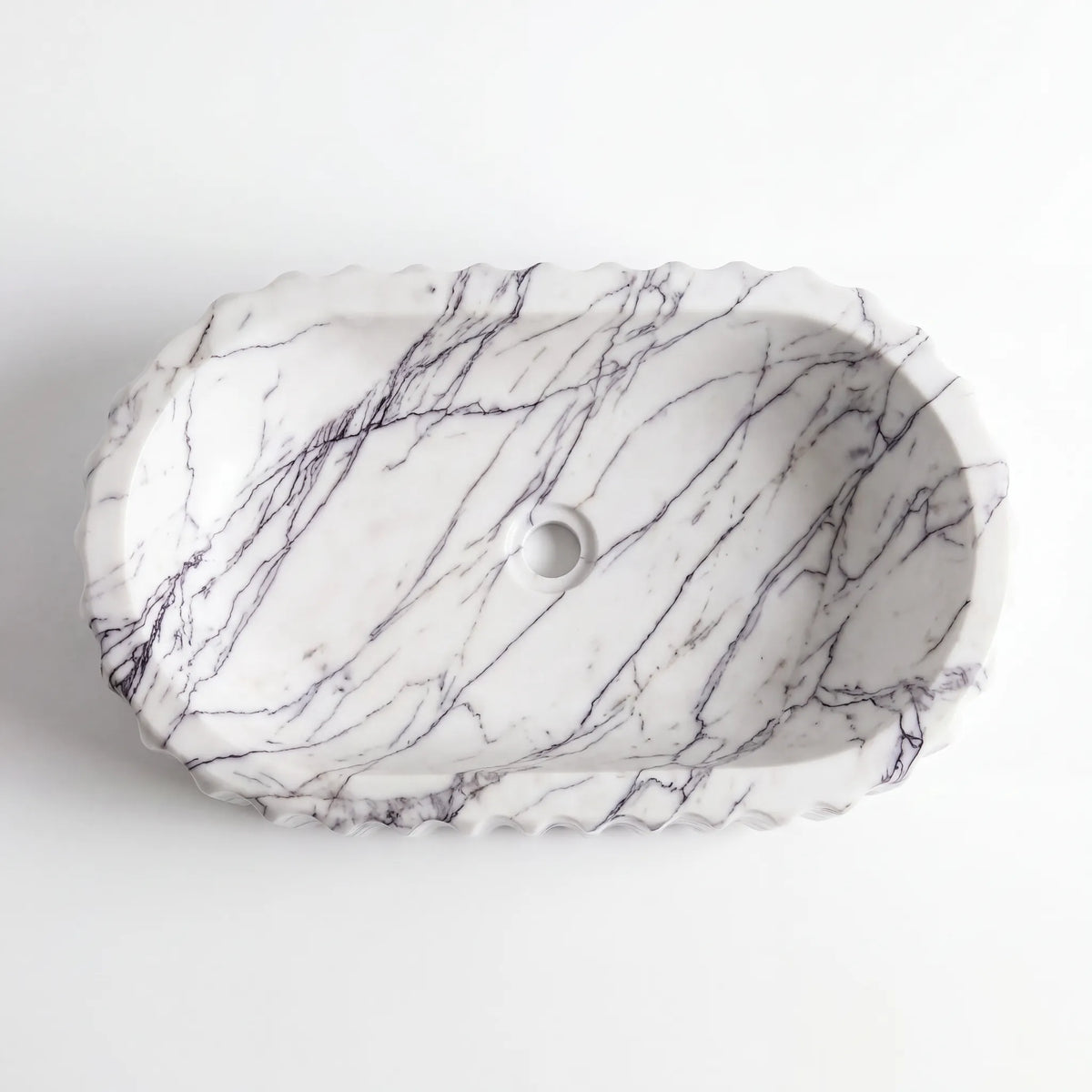 Detailed view of RMD-102 Lilavelle Lilac marble vessel sink showing distinctive natural veining