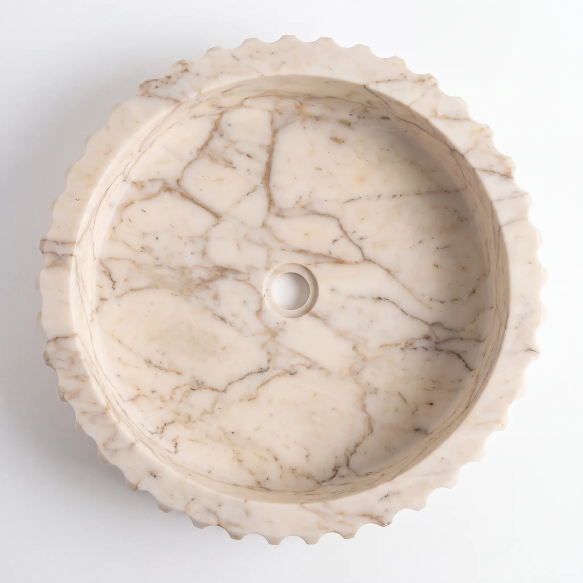 Detailed view of RMD-107 Aurevessa Calacatta Gold marble vessel sink showing elegant golden veining