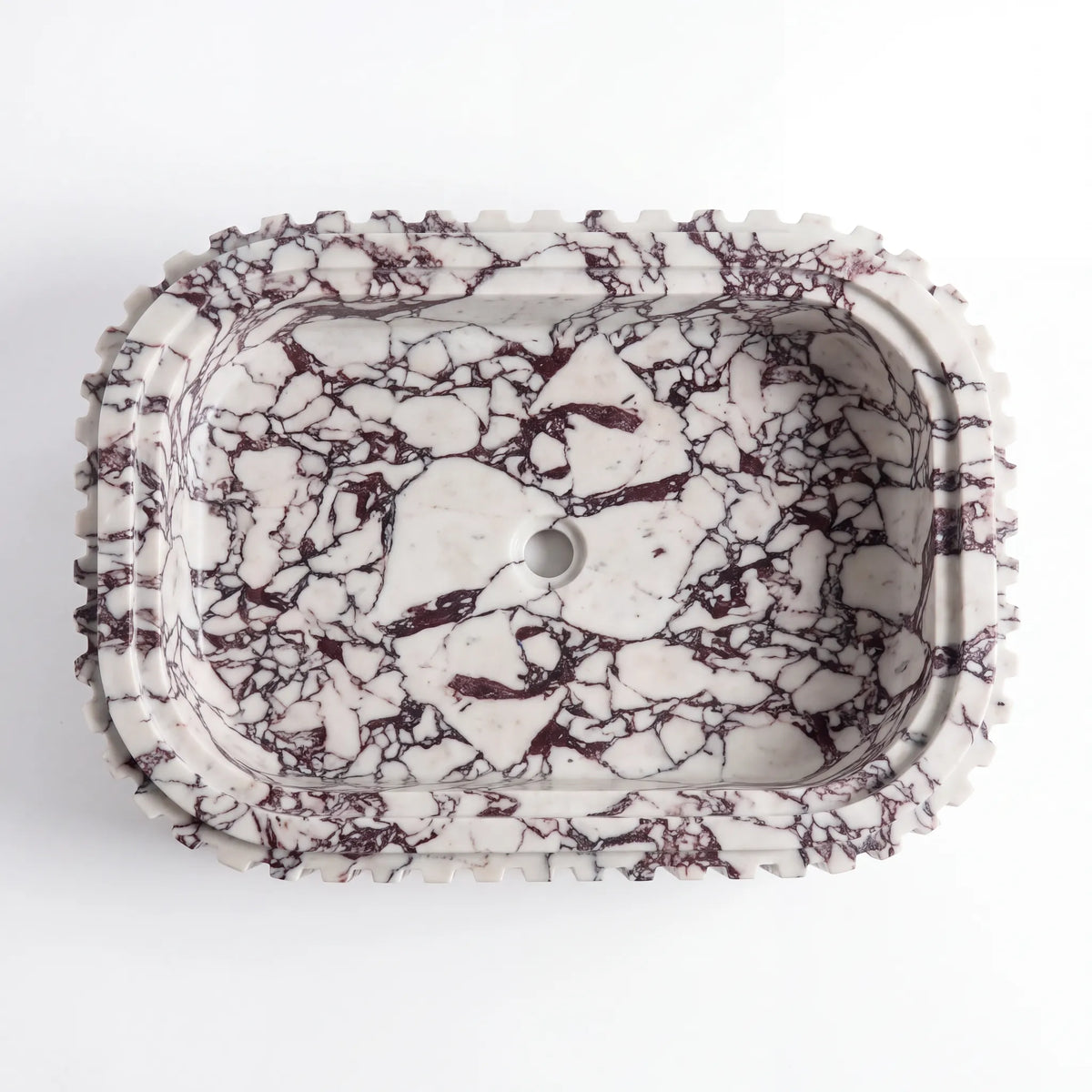 Detailed view of RMD-110 Violenne Calacatta Viola marble vessel sink showing dramatic natural veining