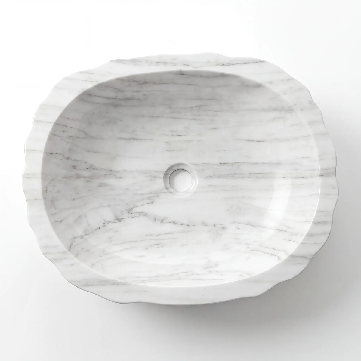 Detailed view of RMD-121 Carravena Carrara white marble vessel sink showing soft natural veining