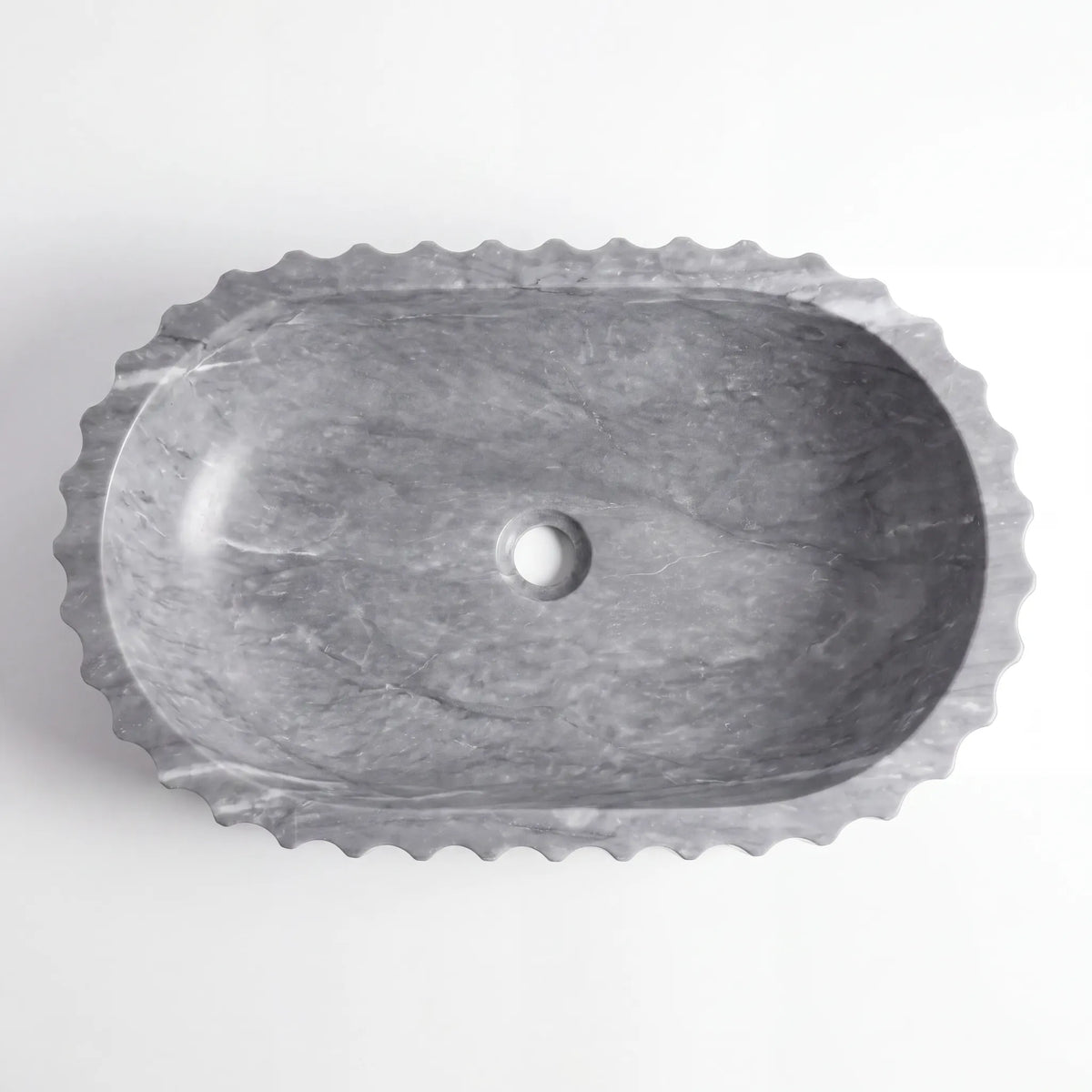 Detailed view of RMD-142 Grivante grey marble vessel sink showing distinctive natural veining