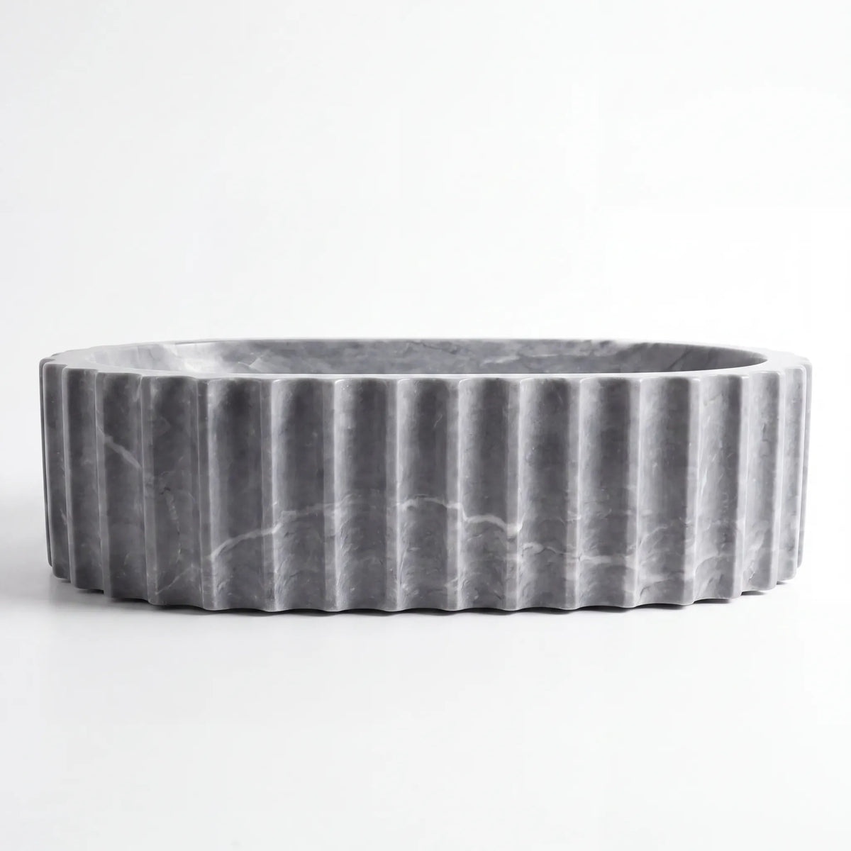 Front view of RMD-142 Grivante round grey marble vessel sink with polished finish