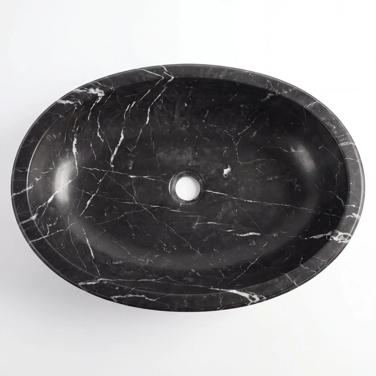 Detailed view of RMD-151 Neromere Nero Marquina marble vessel sink showing distinctive natural veining