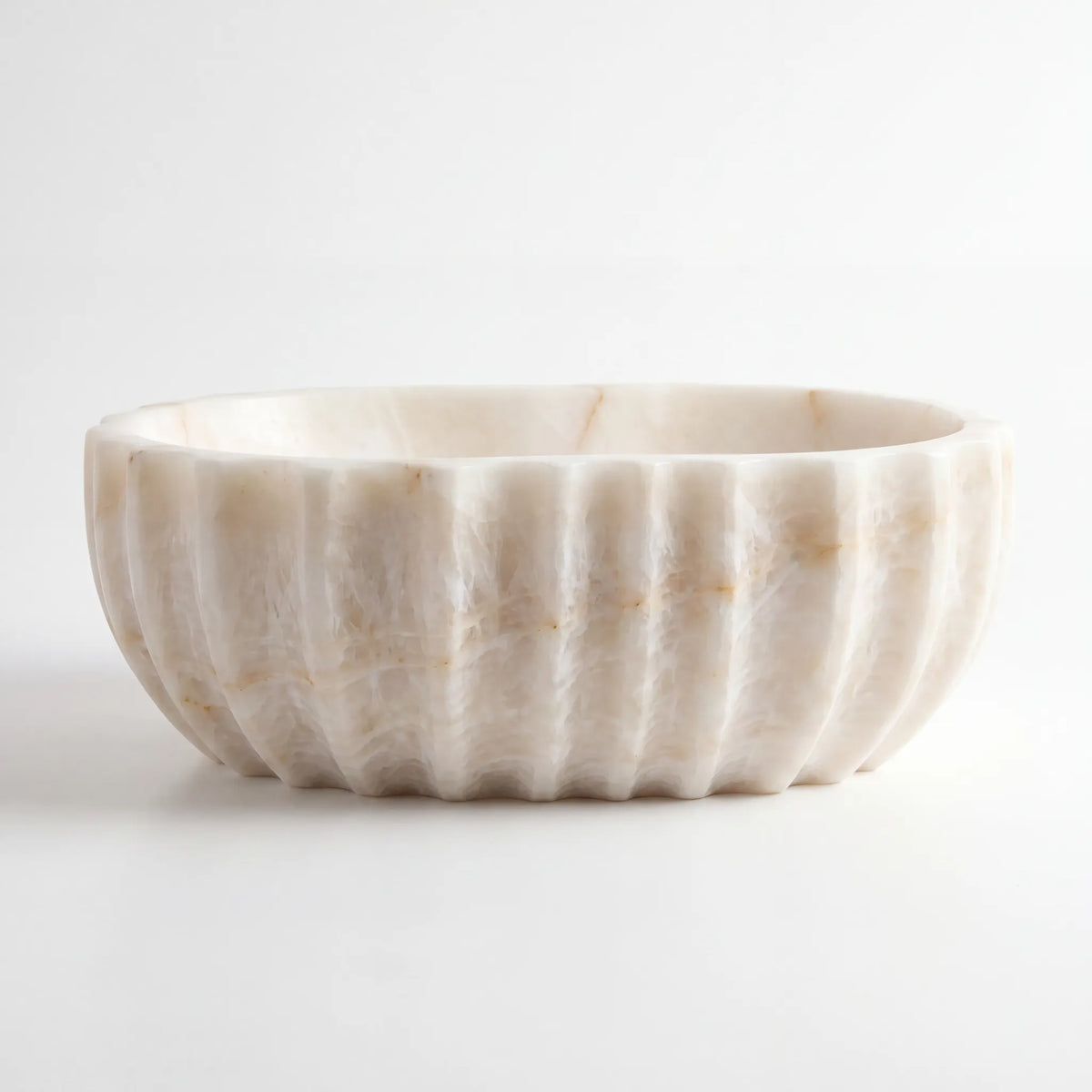 Front view of RMD-156 Cremora round cream and beige marble vessel sink