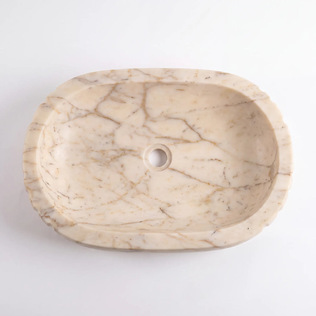 Detailed view of RMD-159 Aurevane Calacatta Gold marble vessel sink showing elegant natural veining