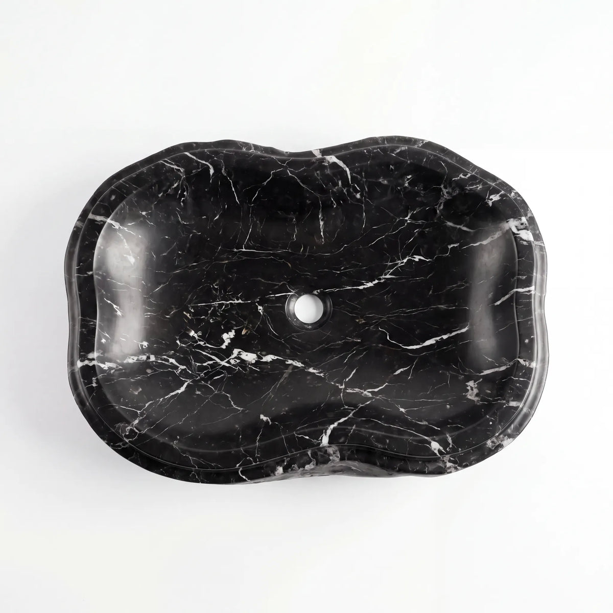 Detailed view of RMD-166 Nerovia Nero Marquina marble vessel sink showing distinctive natural veining
