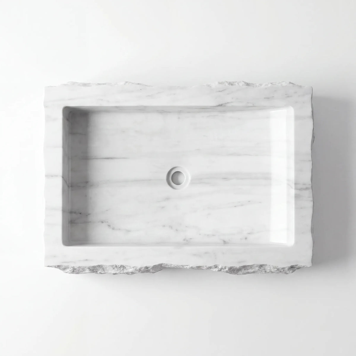 Detailed view of RMD-186 Carravene Carrara white marble vessel sink showing elegant natural veining