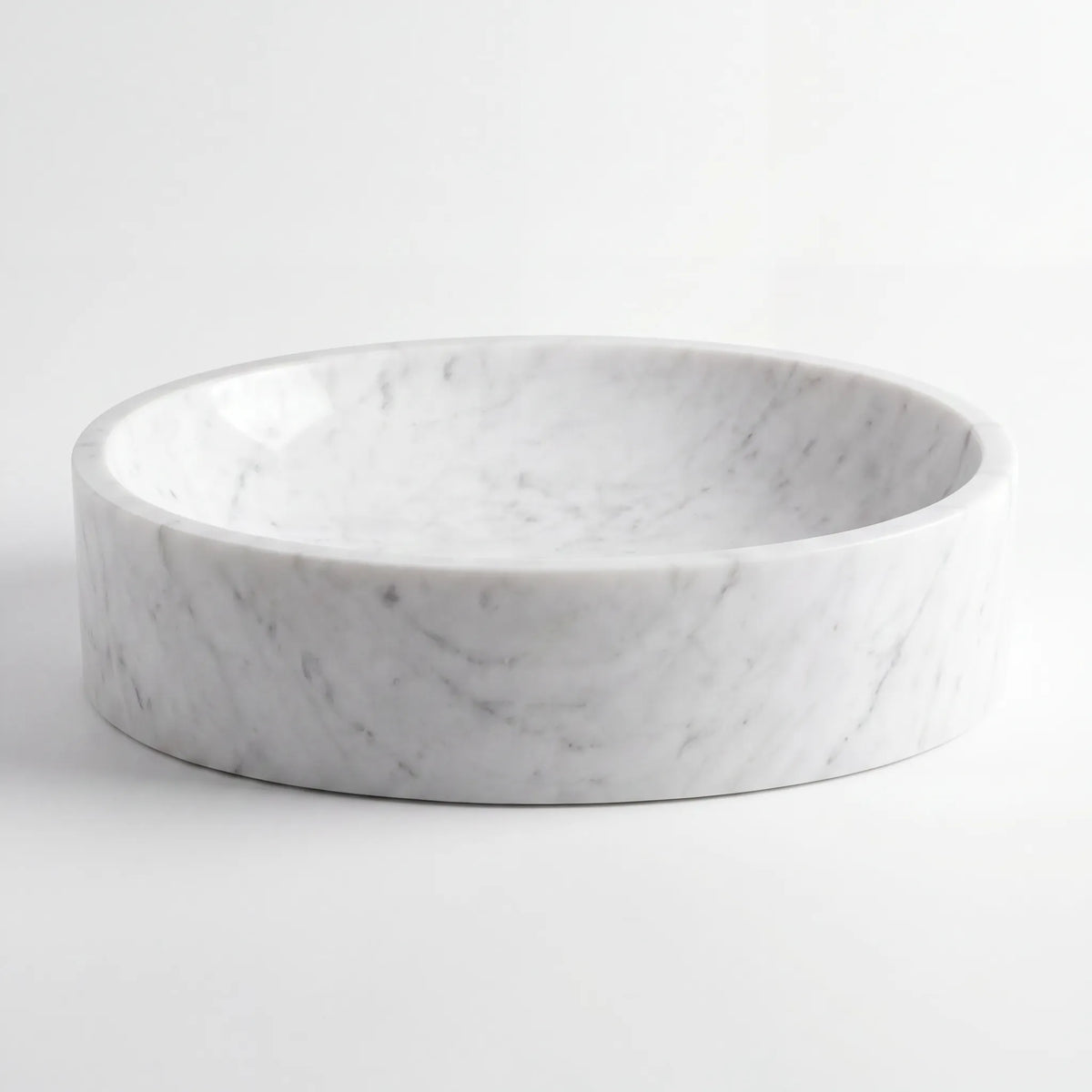 Front view of RMD-194 Carralune round Carrara white marble vessel sink with polished finish