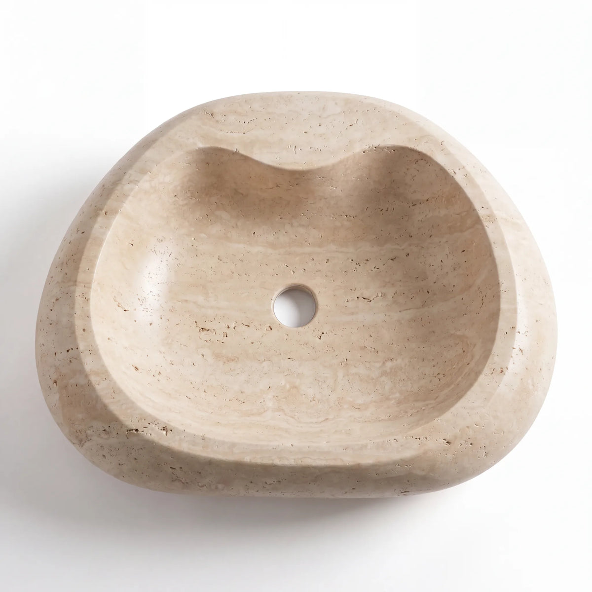 Detailed view of RMD-218 Travora vessel sink showing distinctive natural travertine texture