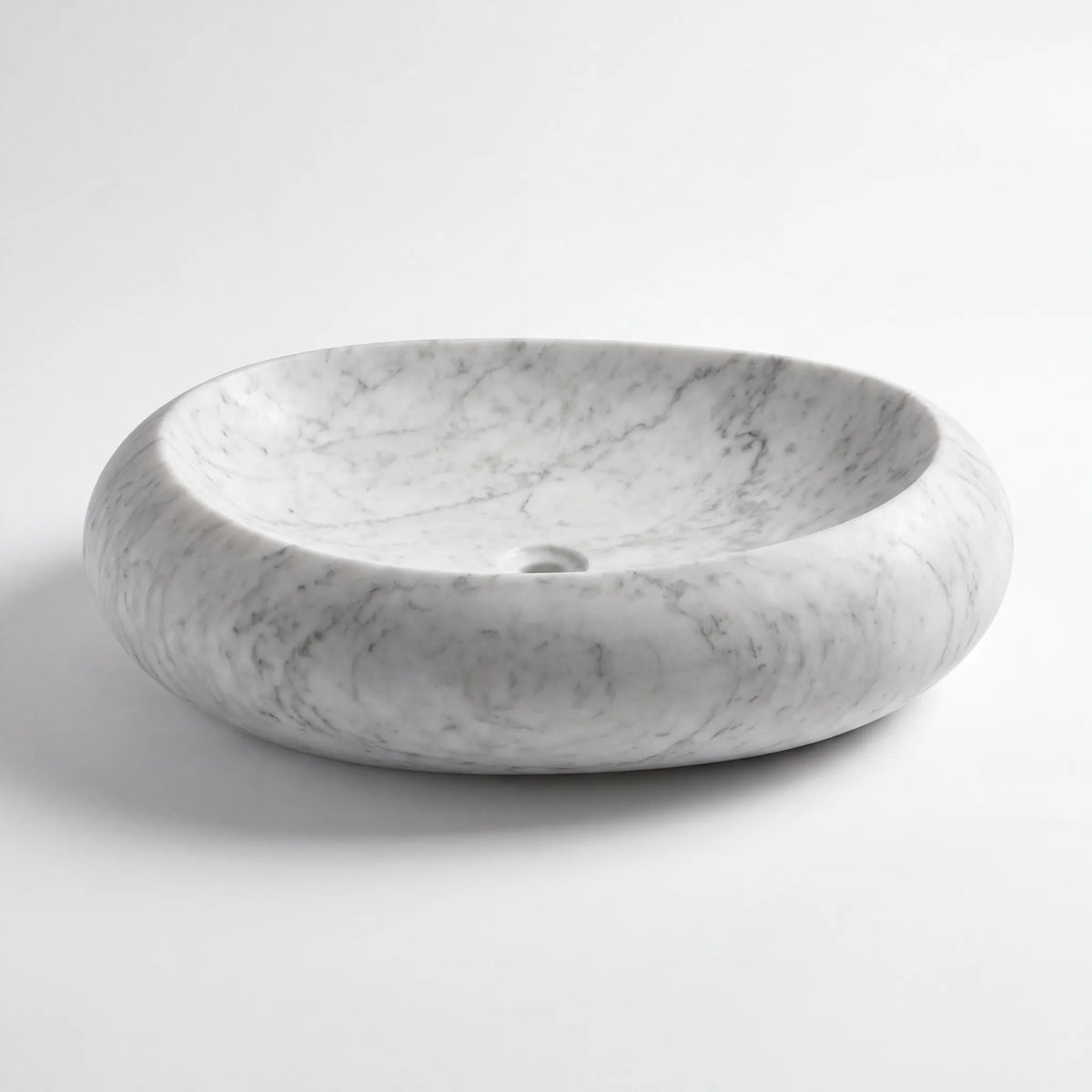 Front view of RMD-227 Carrena oval Carrara white marble vessel sink with polished finish