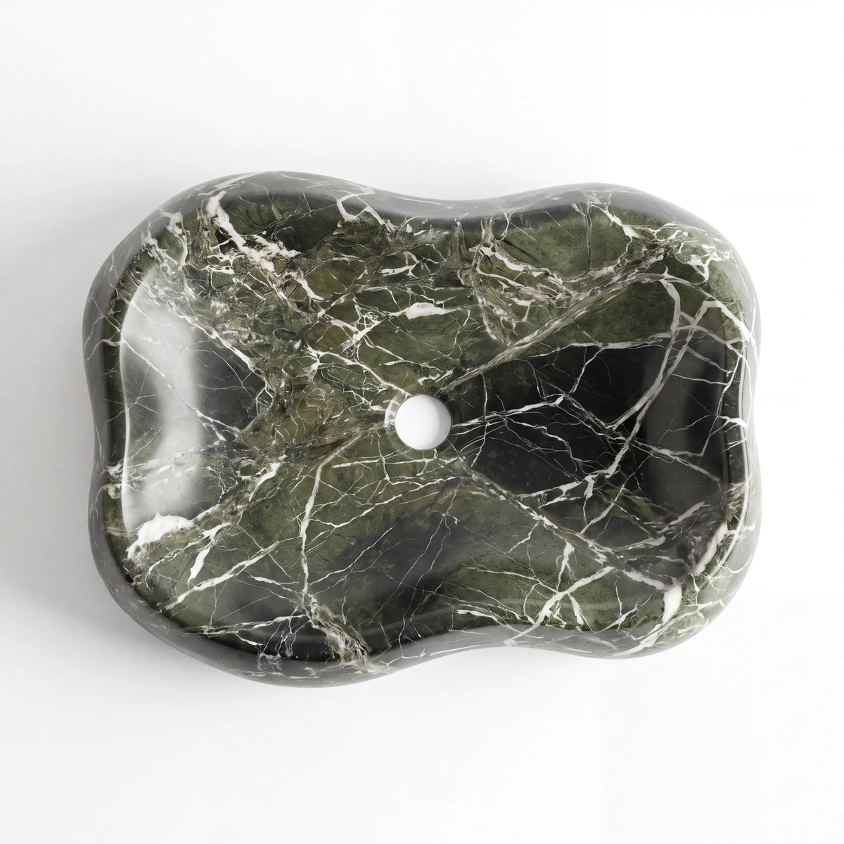 Side profile of the RMD-231 oval vessel basin showcasing its sculptural marble form