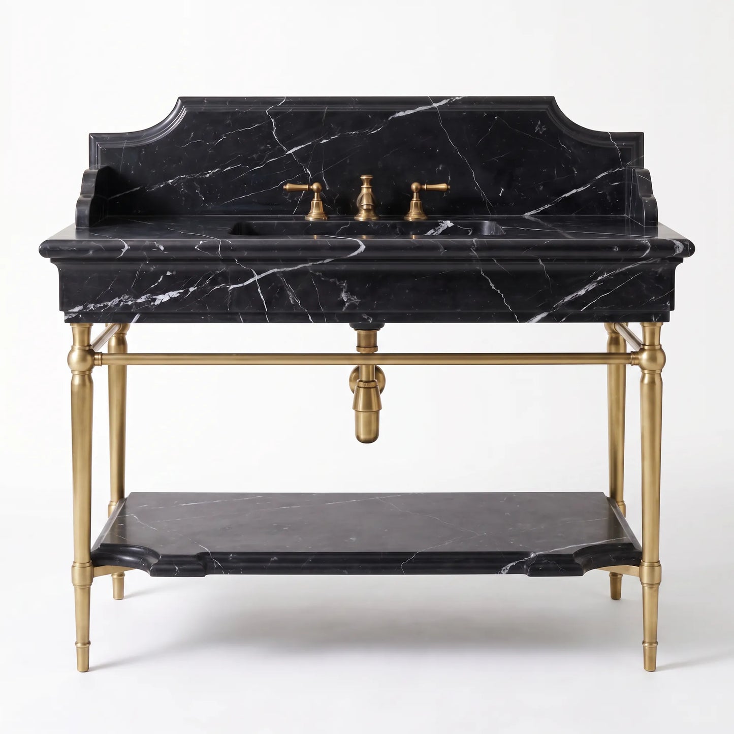 A vintage-style double-sink vanity featuring a black marble top and back panel with white veining, supported by an ornate brass frame with a lower shelf, set against a plain white background.