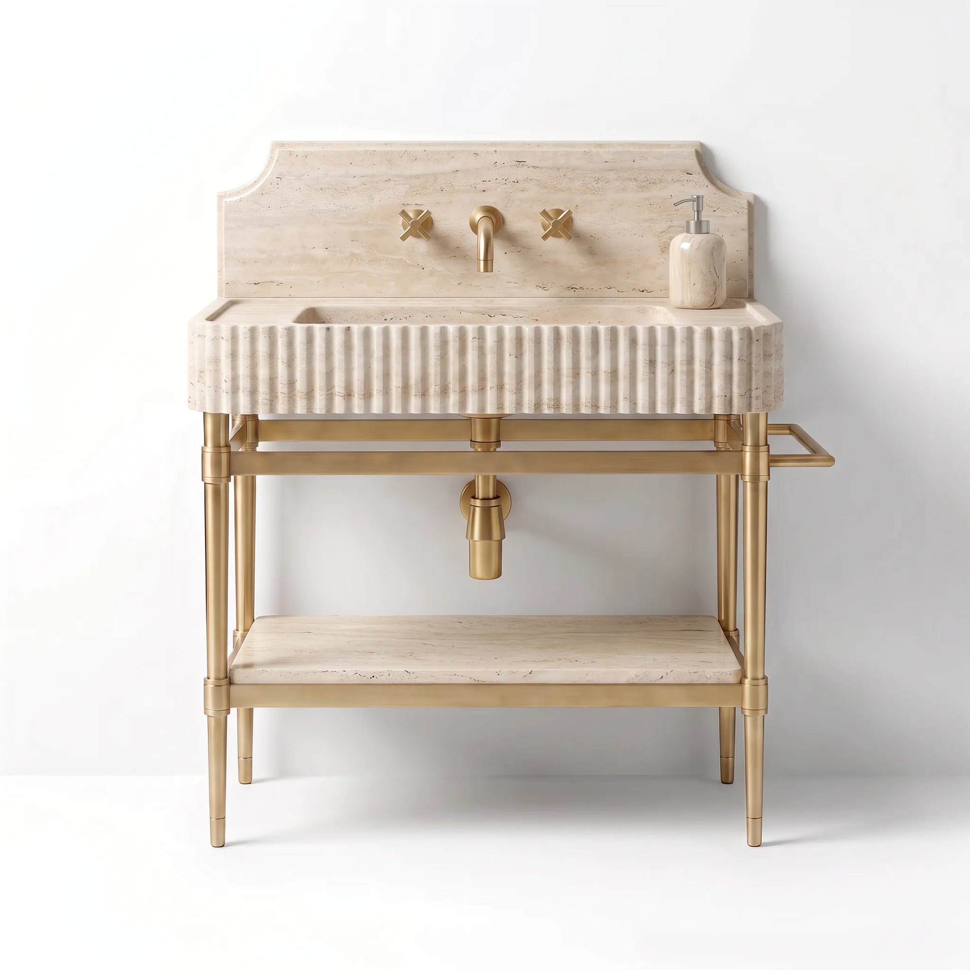 A freestanding bathroom vanity with a ribbed beige stone sink and backplate, gold-tone metal legs and faucet hardware, and a matching soap dispenser on a white background.