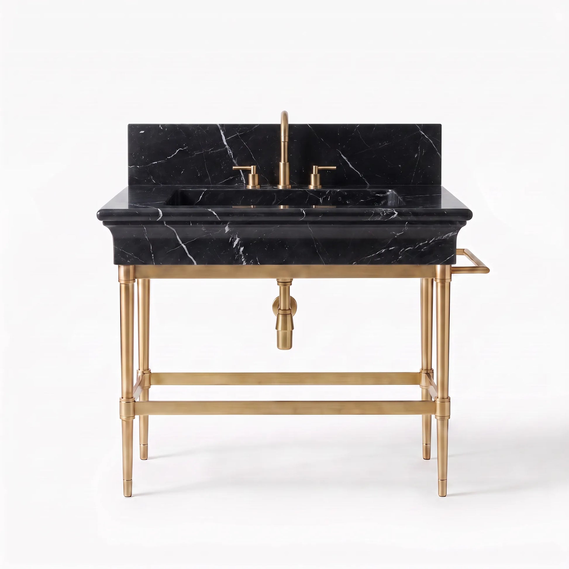 A freestanding bathroom vanity with a black marble sink basin and backplate, paired with a polished gold brass pedestal base and faucet.
