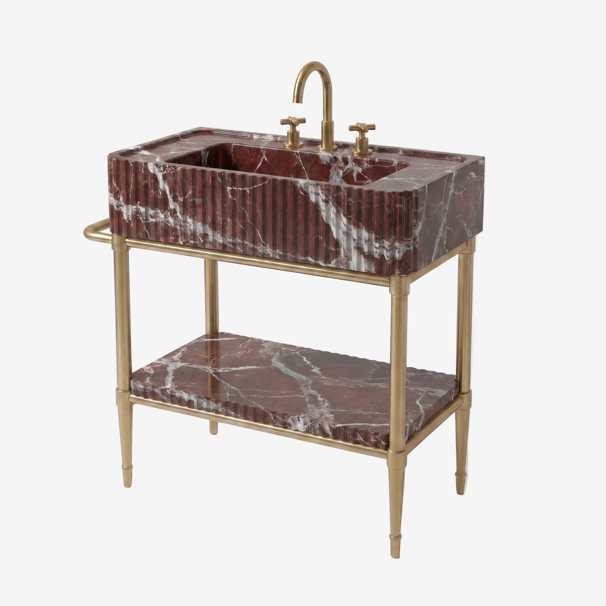 A luxury bathroom vanity featuring a rectangular basin and lower shelf in dark red marble with white veining, supported by a gold-finished metal frame with a curved faucet and two cross handles.