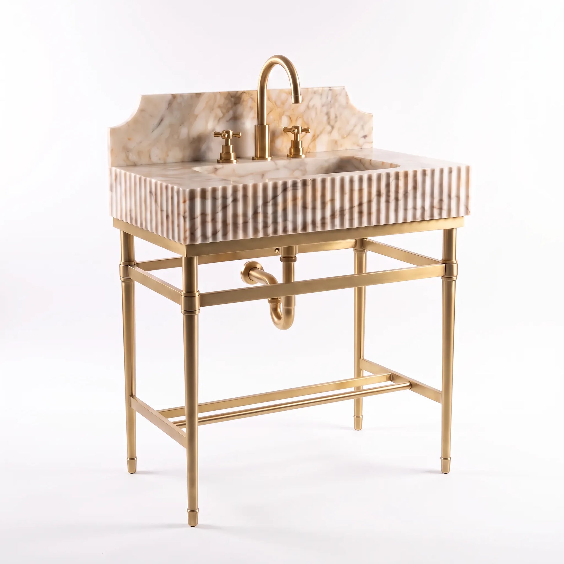 A freestanding bathroom vanity with a rectangular sink basin, striped marble-look front panel, curved backplate, and polished brass-tone metal stand and faucet, shown on a white studio background.